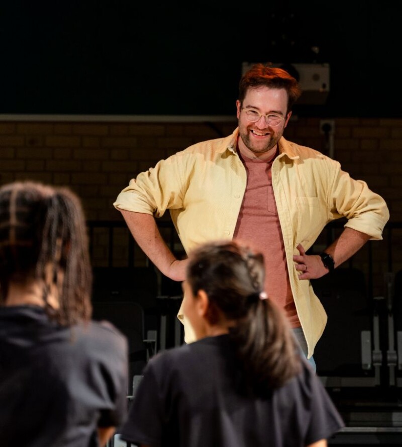 Stagecoach teacher leading students during a performing arts class.