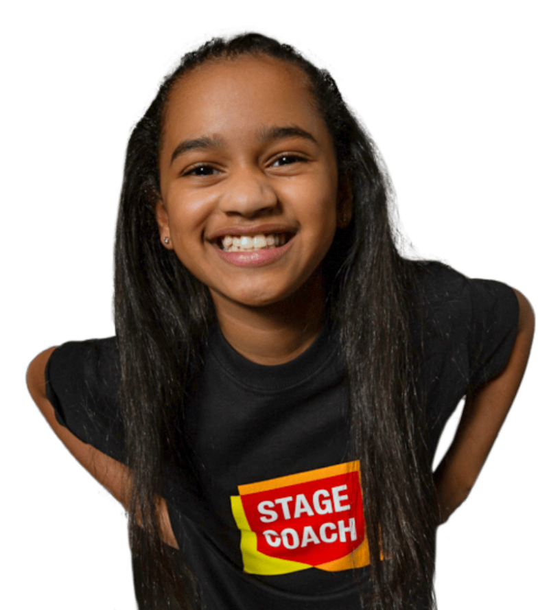 Stagecoach student smiling in a Main Stages performing arts class.