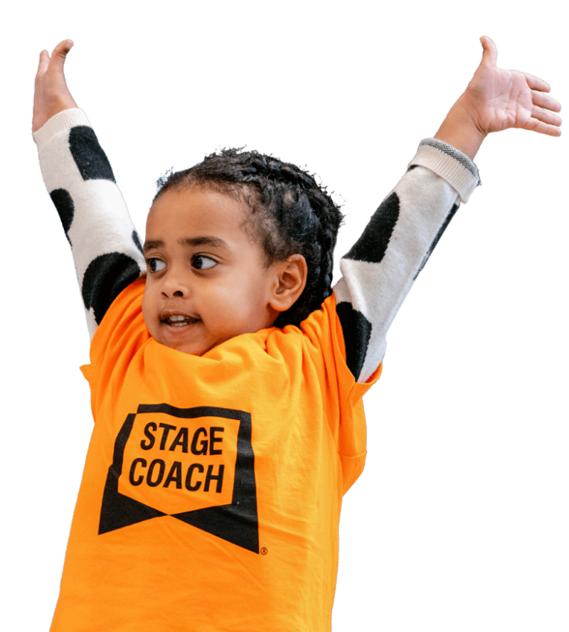 Young Stagecoach student taking part in a Mini Stages class with a parent or caregiver.