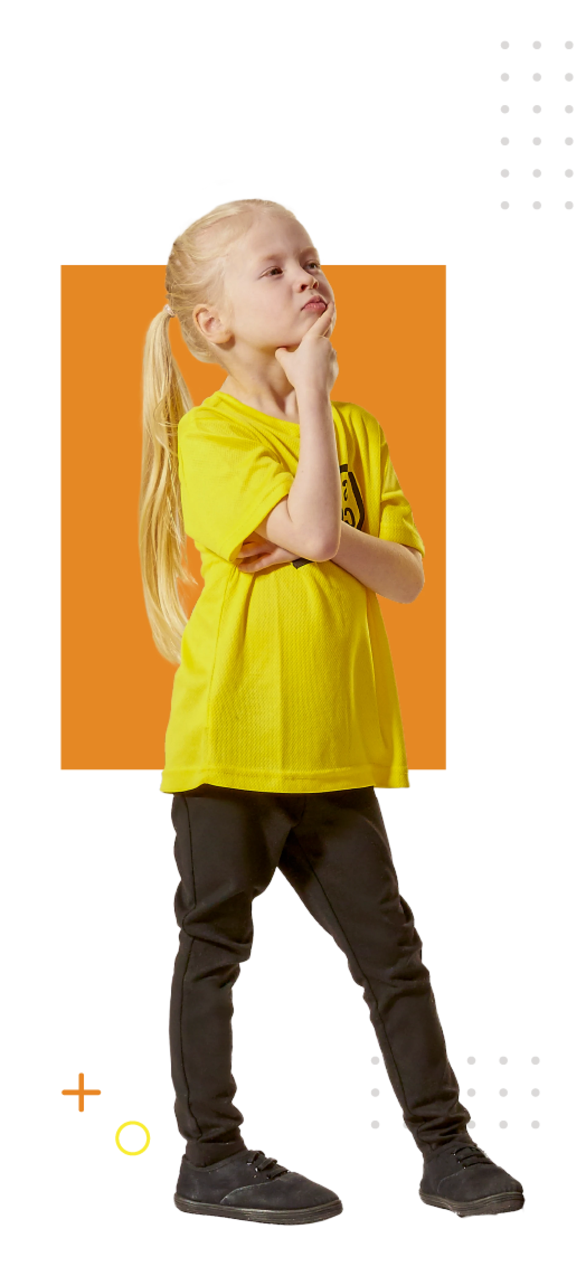 Young Stagecoach student in a yellow uniform posing for performing arts classes.